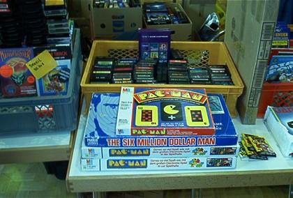 [Photo: Pac-Man game (played with cards or on a board)]
