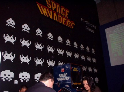[Photo: Space Invaders exhibit]