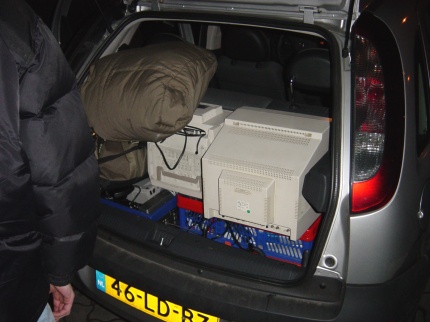 [Photo: Loading the car]