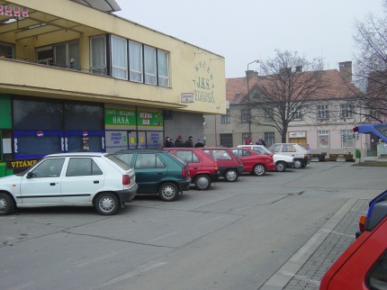 [Photo: The party location above a shop and pub]