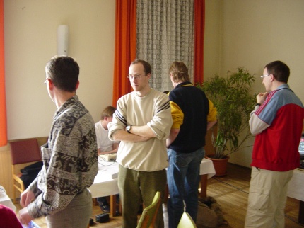 [Photo: People standing around...]