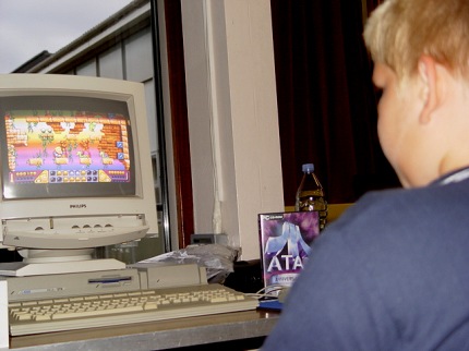 [Photo: Steve Sweet's son playing Magic Boy]