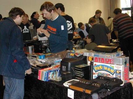 [Photo: Make your choice on Atari VCS consoles or Pac-Man board games]