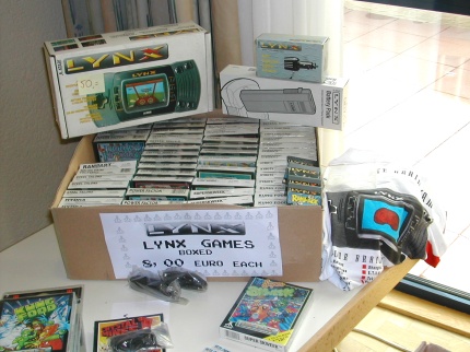 [Photo: Lynx hand-held console and games for sale. Also a T-shirt with picture for fans]