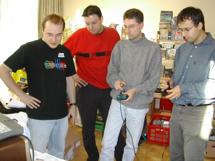 [Photo: Mad Butcher explains the rules of Bremspunkt, while contestants practice the game]