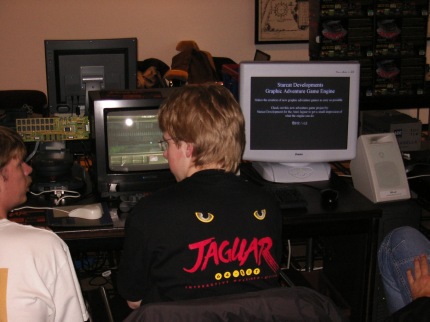 [Photo: Starcat explaining Eerievale to TXG]