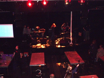 [Photo: Band on stage]