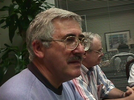 [Photo: George Iken at a H.A.C.E. meeting]