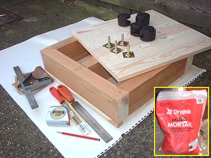 [Photo: Beginning of the wooden stand]