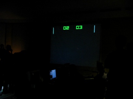 [Photo: Whip-Pong on the projector]