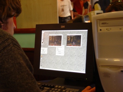 [Photo: Thomas editing a screen-shot of Doom]