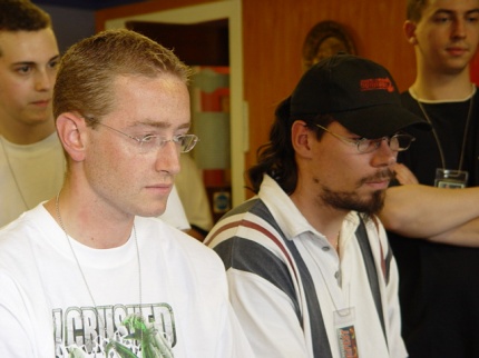 [Photo: Two players concentrating]