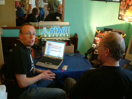 [Photo: Matthew talking to Mark Branson]