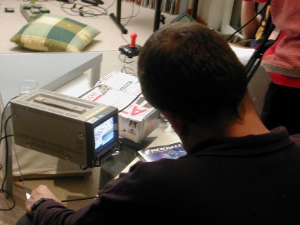 [Photo: Checking the video monitor]