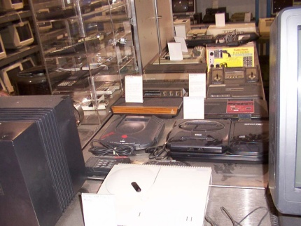 [Photo: Atari game systems mixed in with the other systems]