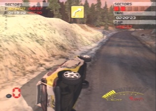 [Screen-shot: Opel Corsa on its side]