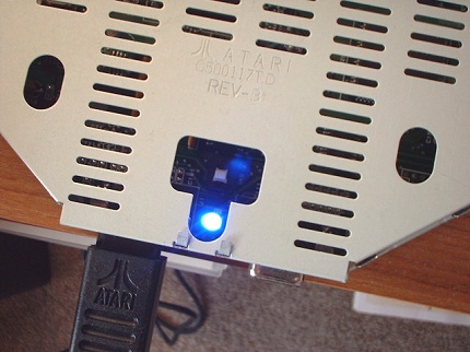 [Photo: New blue LED in place]