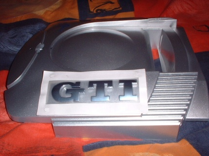 [Photo: Applying the badge]