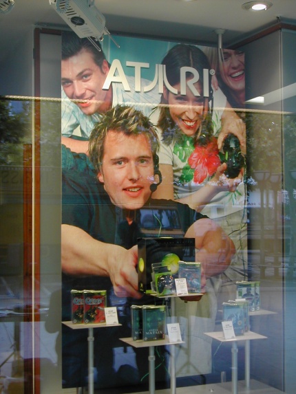 [Photo: Atari advertisement in shop window]