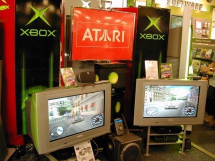 [Photo: Large Atari sign the size of TV sets]