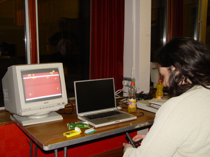 [Photo: Ian Smith playing Pong]
