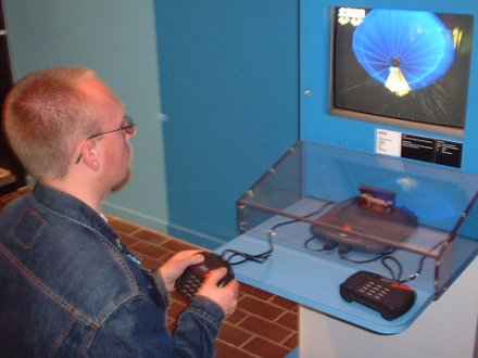[Photo: Matthew playing Tempest 2000 on a Jaguar]