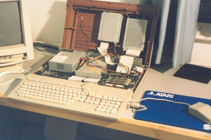 [Photo: Mega STE open by the window]