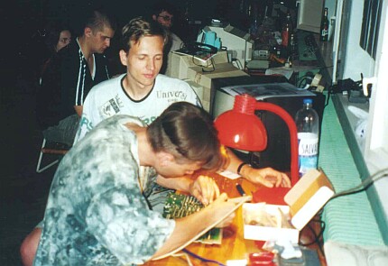 [Photo: Satantronic upgrading TWH's 130XE to 1 MB]