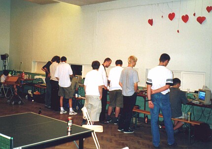 [Photo: Party people standing]