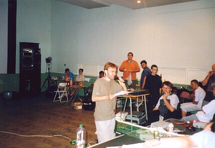 [Photo: Vasco presenting the competitions]