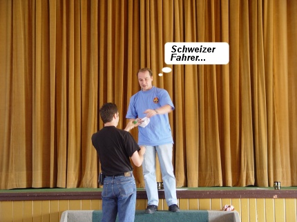 [Photo: Sacha receiving his prize]